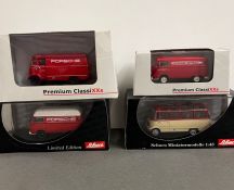 Two Schuco Porsche model vans and two premium classic XXXS Porsche diecast vans