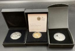 A selection of three Royal Mint Silver coins to include 2009 Charles Darwin £2 silver proof coin,