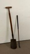 A vintage spade with wooden handle and wooden golf club, stamped R D and C