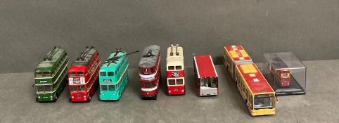 A selection of eight toy buses to include Rob Trolley buses and a bendy bus