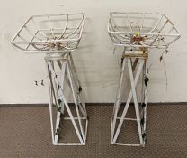 A pair of white painted metal plant stands (H69cm)