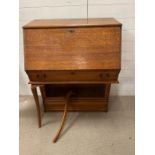 A Globe Wernicke bureau desk with drop front and inset pigeon holes and drawers AF