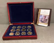 The London Mint Office The Royal House of Windsor Coin Collection, boxed and with folder with