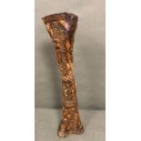 A carved Bovine Bone depicting African Warriors (H57cm)