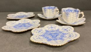 A selection of Wileman and Co pre Shelly china to include three plates, two cups and saucer and