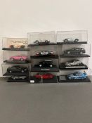 Twelve boxed Rally and Racing diecast vehicles, various years.