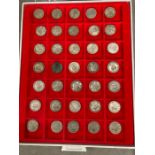 35 shillings in display case 1920- 1950, mostly pre 1947 silver coins.