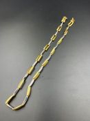 An 18ct gold necklace, marked 750, made in Italy (Total Approximate Weight 20g)