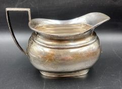 A silver milk jug, hallmarked Birmingham 1858 for by S Blanckensee & Son Ltd (Approx 198g)