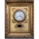 A giltwood framed wall clock by Le Roi Paris