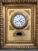 A giltwood framed wall clock by Le Roi Paris