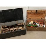 A selection of vintage tools in a wooden storage box