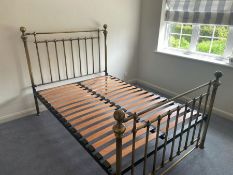 A metal and brass double bed frame (a\f no bolts)