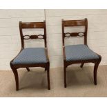 A pair of regency style chairs