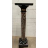 A red veined central marble column with black marble top and bottom (H114cm Sq29cm)