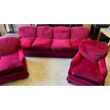 A vintage velvet red sofa and two arm chairs (Sofa H80cm W286cm D100cm Chairs H80cm W80cm)