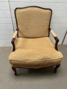 Louis XV style chair with padded arms and cabriole legs