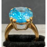 A 9ct gold and Topaz ring (Approximate Size R)