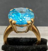 A 9ct gold and Topaz ring (Approximate Size R)