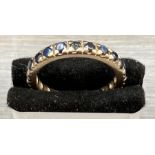 A Sapphire eternity ring in a platinum setting (Size M)