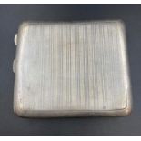 A silver cigarette case, hallmarked for Birmingham 1918 by William Neale & Son Ltd