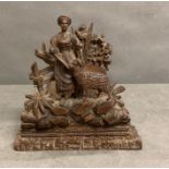 A pair of ornate hand carved adjustable book ends of a pastoral scene