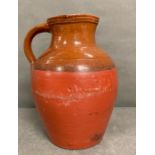 A large terracotta pitcher
