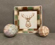 Two decorative ceramic bowls and a trinket dish depicting a stag