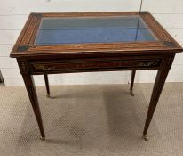 A mahogany inlaid bijouterie table, opening to velvet lined interior (H80cm W86cm D54cm)