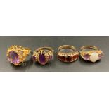 A selection of four 9ct gold rings in various styles with various stone settings.(19.3g)
