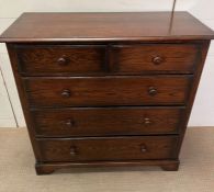 An oak chest of drawers (H104cm W106cm D45cm)