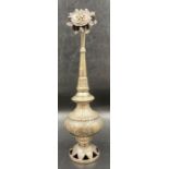 A white metal Omani rose water vase.