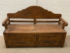 A wooden hall bench seat with drop down storage to base (H 87 cm x D 47 cm x W 132cm)