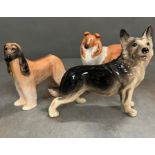 Three Beswick ceramic dogs