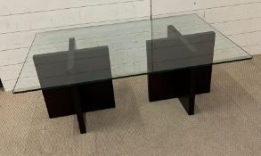 Natuzzi Italia glass table with cross design supports