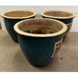 Three blue glazed garden pots