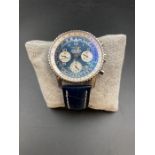 A Breitling Chronometer Navitimer A23322 with Blue face and blue leather strap.