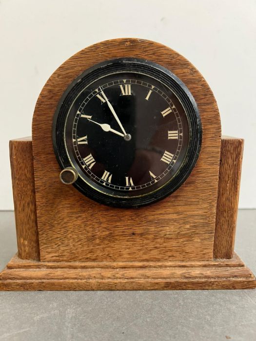 A dashboard clock 1920's possibly from Bugatti classic car in an oak case