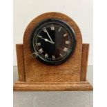 A dashboard clock 1920's possibly from Bugatti classic car in an oak case