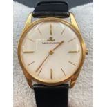 A Jaeger Le Coultre 18ct gold Gents watch on black leather strap (1003228)