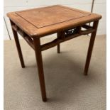 A Chinese hardwood table (H56cm Sq50cm)