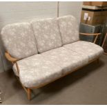 Three seater Ercol blonde sofa with cushions