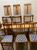 A dining table and chairs, various styles, slat backs and peg end tables (H75cm W170cm D79cm)