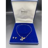 A 9ct gold necklace with pearl pendant and matching earrings