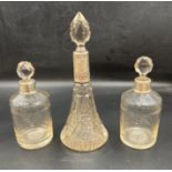 Three silver necked glass scent bottles