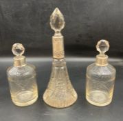 Three silver necked glass scent bottles