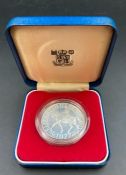 A Silver Jubilee coin, silver crown in box