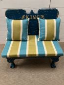 A painted bench seat with the words "King" on the back, on ball and claw feet (H77cm W76cm D50cm