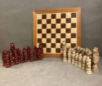 A large fantasy themed chess set and board