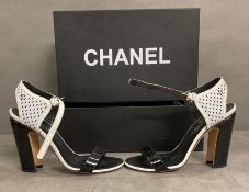 A Pair of Chanel open toe high heels (Size 371/2)